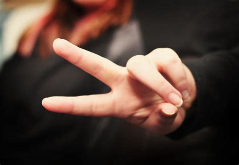 17 Hand Signals Teens Make & What They Mean | CafeMom.com