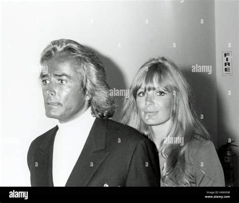 Linda Evans and then-husband John Derek. © Nancy Barr / MediaPunch ...