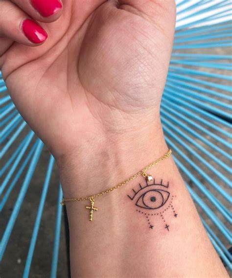 Pin by Marlana Laffita on tiny tattoos in 2024 | Small wrist tattoos, Wrist tattoos, Intimate ...