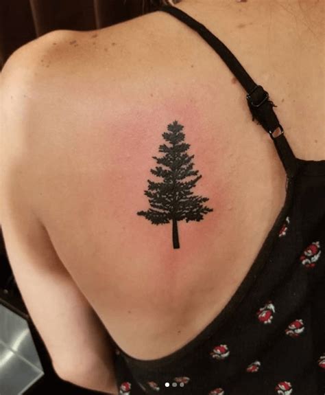 Colorado Pine Tree Silhouette Tattoo | Best Tattoo & Piercing Shop & Tattoo Artists in Denver