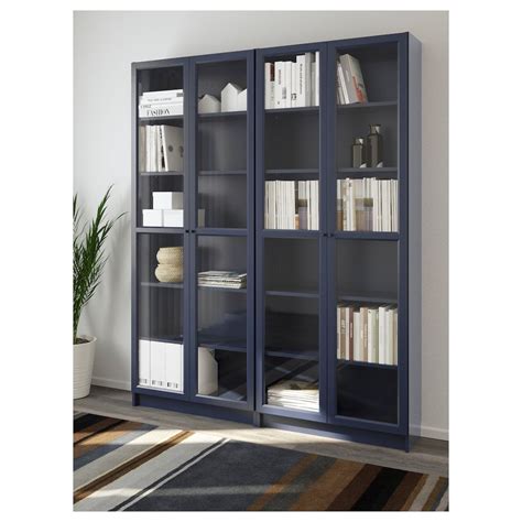 BILLY bookcase, dark blue, 63x113/4x791/2" - IKEA | Bookcase with glass doors, Interesting ...