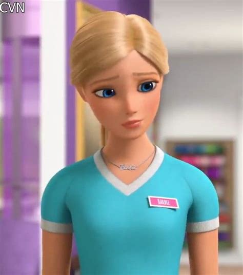 the barbie doll is wearing a blue shirt and has a name tag on her chest