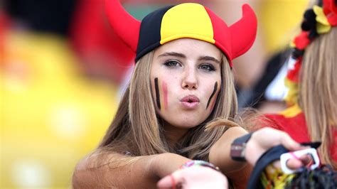 Red, yellow, and black devil hat, Axelle Despiegelaere, FIFA World Cup ...