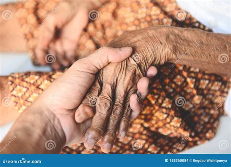 Senior Patient and Nurse - Pulse Measurement by Hand Check the Heart ...