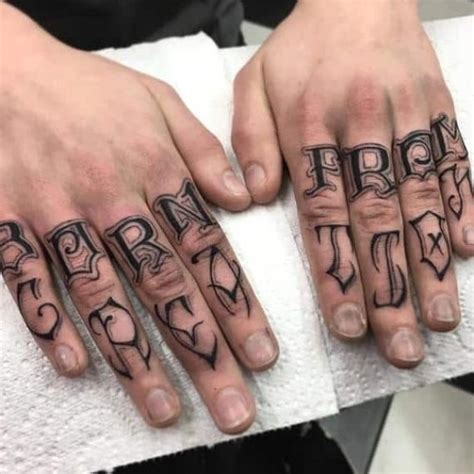 Brass Knuckles Tattoo On Hand