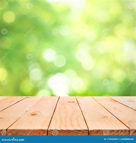 Real Wood Table Top Texture On Blur Leaf Tree Garden Background.For Create Product Display Or ...