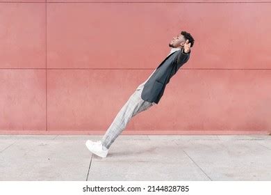 Africanamerican Man Falling Backwards Onto Concrete Stock Photo 2144828785 | Shutterstock