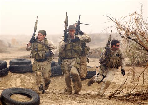 SEAL team members practice desert training exercises in preparation for real world scenarios ...