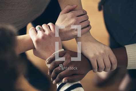 Interlocked hands. — Photo — Lightstock