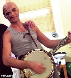 This is Ramin Karimloo in Phantom makeup, playing the banjo...you're ...