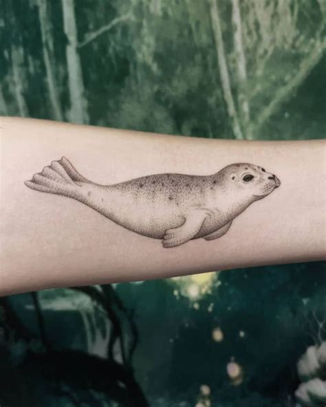 30 Pretty Seal Tattoos You Need to Copy | Seal tattoo, Animal tattoos for women, Black line tattoo