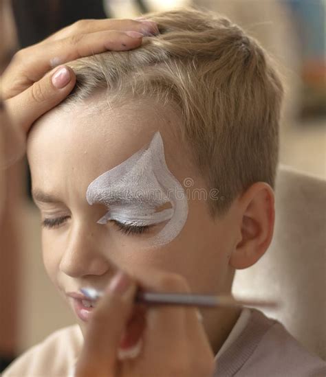 Master Making Aqua Makeup on Boys Face. Face Painting Kids Stock Image - Image of funny ...
