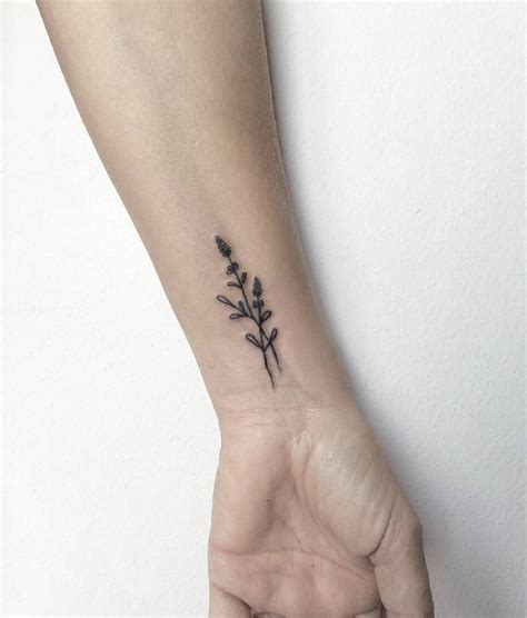 Tiny floral tattoo on wrist by Marina Latre | Tattoos for women, Floral tattoo, Tattoo designs wrist