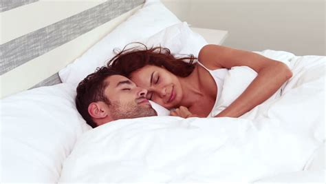 Close Up Of Sweet Couple Cuddling In Bed Stock Footage Video 10399151 | Shutterstock