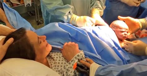 Watch woman give birth through 'natural caesarean' as amazing footage shows baby wriggle itself ...