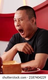 Asian Man Yawning Dining Table Stock Photo 2187404229 | Shutterstock