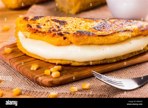 Cachapa with cheese, typical Venezuelan dish made with corn, cheese and butter Stock Photo - Alamy