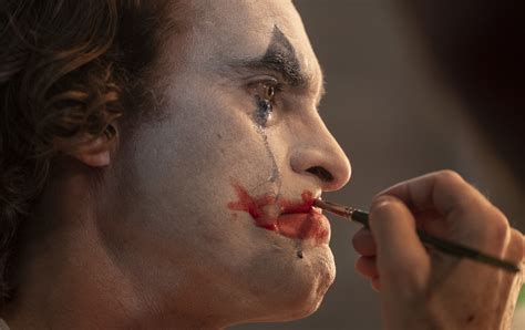 How Joker got his iconic hair and makeup | SYFY WIRE