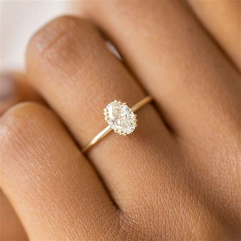 Unveiled Ring, 0.7ct. Oval Diamond | Hippie engagement rings, Simple ...