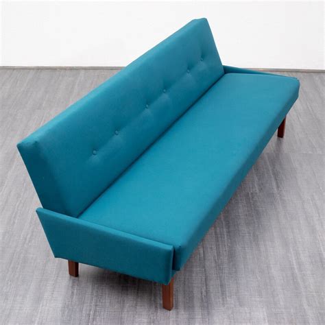 Teak sofa with folding mechanism - 1960s