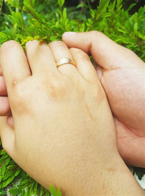 Couple Hand With Ring Showing Love Stock Image - Image of landscape, marriage: 153936417