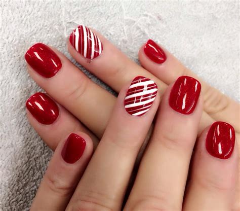 Red and candy cane | Christmas gel nails, Candy cane nails, Work nails