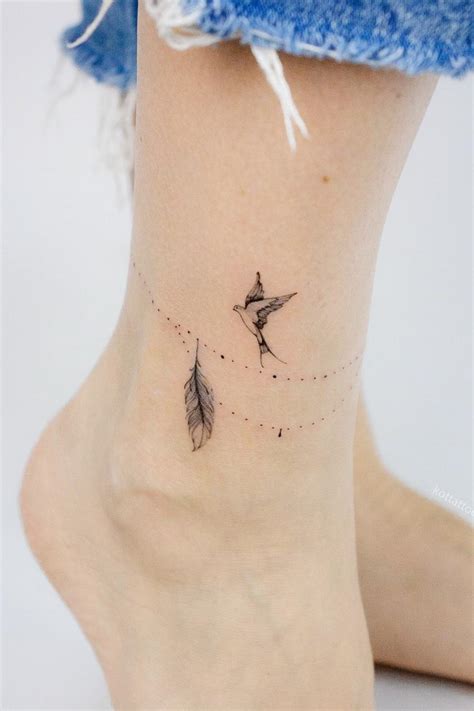 Feathered Delights: Enjoy the beauty of small feather tattoo designs ...