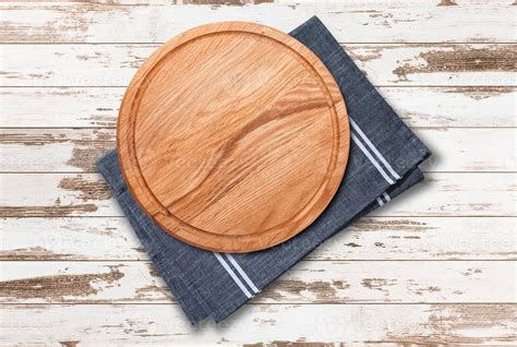 Pizza board with napkin on wooden table. Top view mockup 14593233 Stock ...