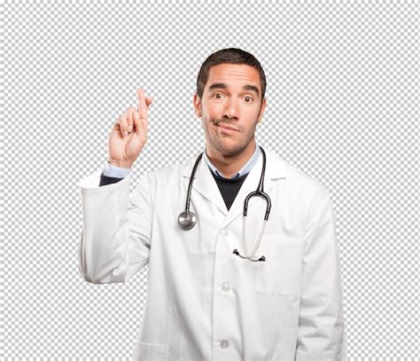 Premium PSD | Hopeful doctor with finger cross gesture