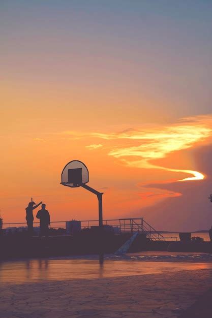 Premium Photo | Silhouette of ferris wheel at sunset