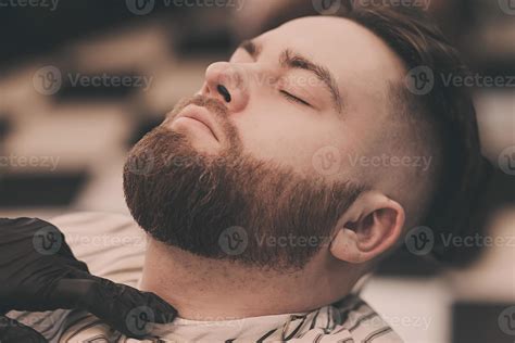 Man with beard in barber shop. 5966897 Stock Photo at Vecteezy