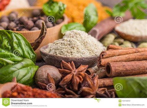 Heaps of Various Ground Spices on Wooden Background. Georgian Spices, Indian Spices, Arabian ...