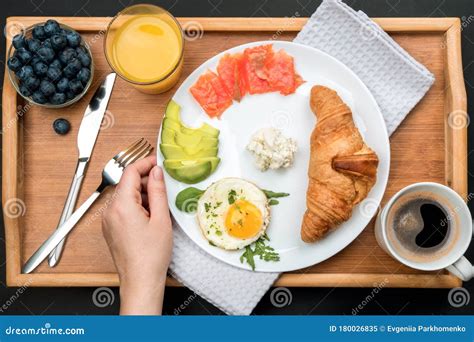 European Breakfast With Fresh Croissants, Fried Eggs, Herbs And Orange ...