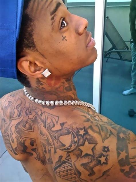 Soulja Boy back and cheekbone tattoos - Tattoomagz.com › Tattoo Designs ...