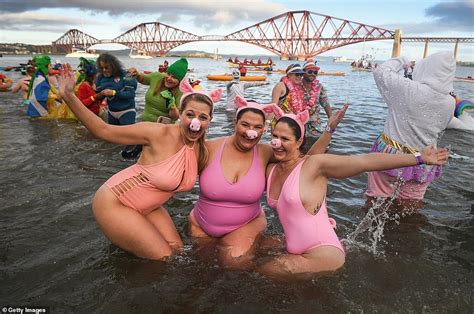 People all over the world participate in Polar Bear Plunges across the globe on New Year's Day ...