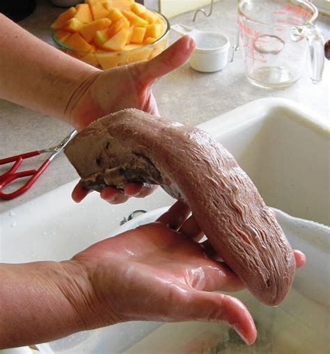 a person is washing their hands with soap and other food items in the ...