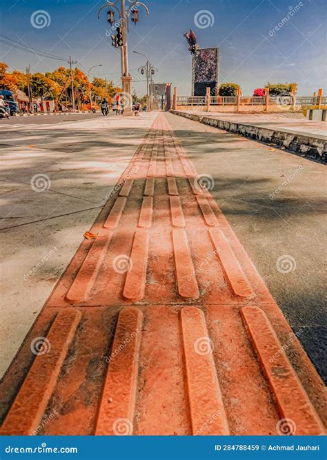 Sidewalk with Dotted Line Ornament in the Middle Stock Image - Image of highway, building: 284788459