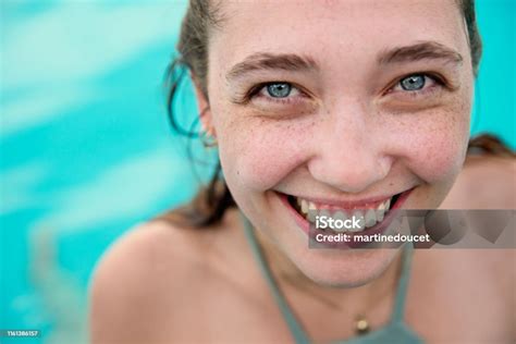 Beautiful Young Woman Swimming In Pool Stock Photo - Download Image Now - Active Lifestyle ...