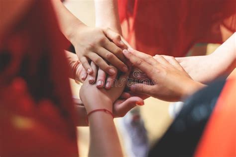 Team of Kids Children Basketball Players Stacking Hands in the Court, Sports Team Together ...