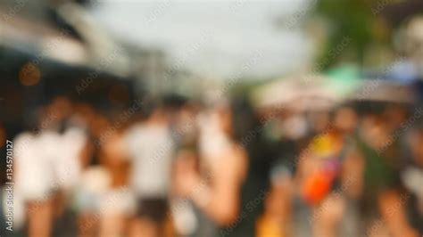 Blur background anonymous crowd of people walking on Jatujak market ...