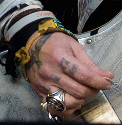 Johnny Depp Changes Tattoo of Amber Heard’s Nickname from ‘SLIM’ to ...