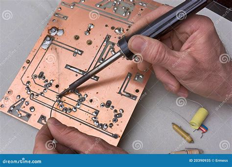 Repair of circuit board stock image. Image of electronic - 20390935