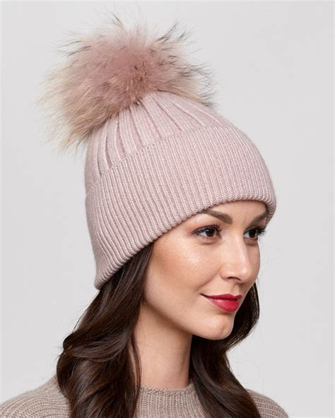 Look like a superstar in our Coco Rib Knit Beanie with Finn Raccoon Pom Pom for her. The shell ...