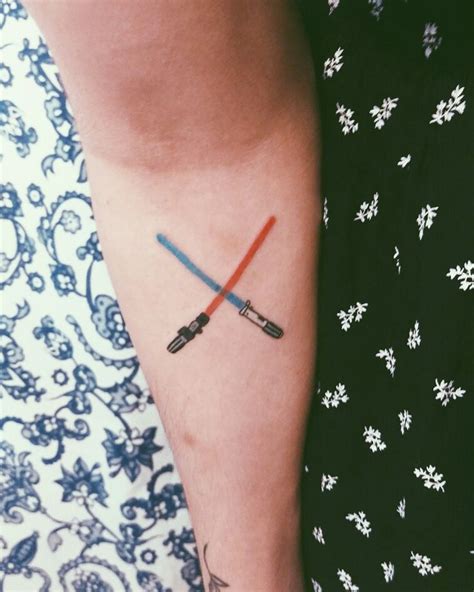 Star Wars Tattoo Anakin and Darth Vader lightsabers | Lightsaber tattoo, Tattoos, Body art tattoos