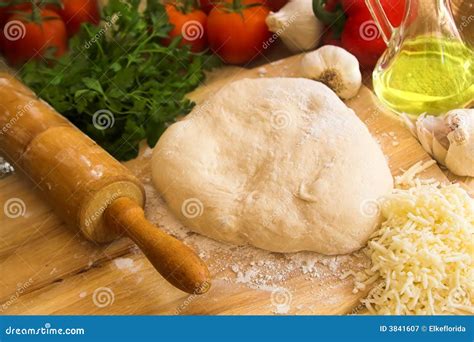 Pizza Dough and Rolling Pin Stock Image - Image of restaurant, preparation: 3841607