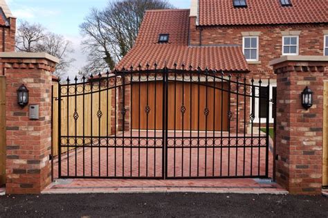 Driveways & Walkways | Iron gate, House gate design, Brick columns