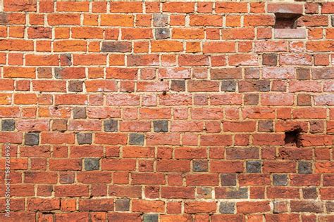 The texture of the walls of red-clay bricks Stock Photo | Adobe Stock