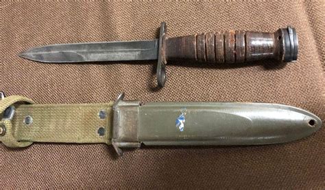 U.S. M4 Bayonet by Kinfolks found with an US M8 Sheath | EstateSales.org