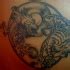 Yin yang with tiger and dragon coloured tattoo - Tattooimages.biz