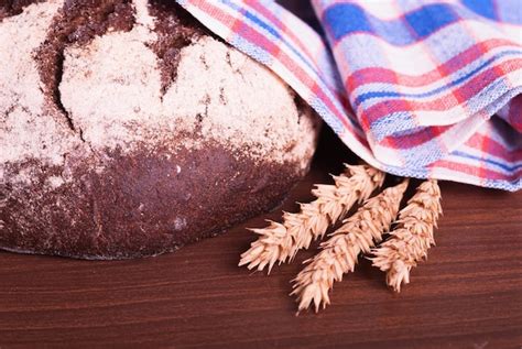 Premium Photo | Bread with wheat on a table